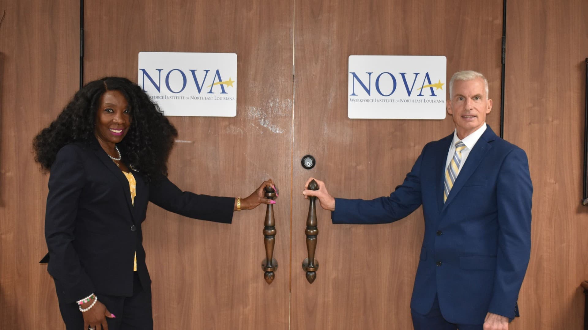 Juanita Woods and Paul West opening NOVA's doors